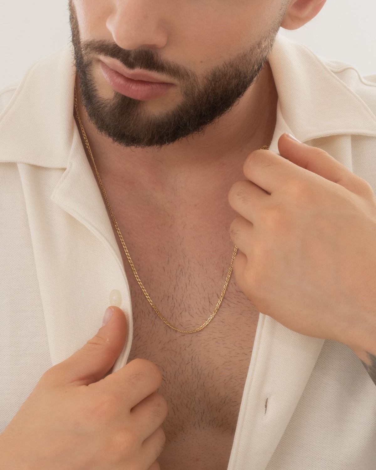 Chain cuban cruzada 2,4 mm 65 Cms oro laminado