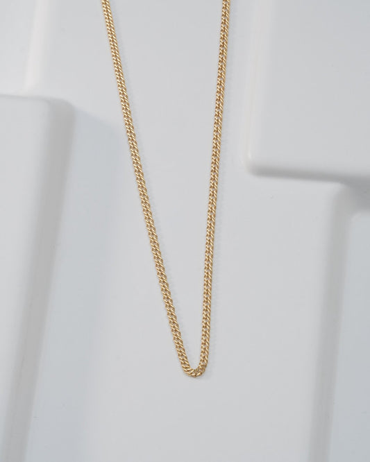 Chain cuban cruzada 2,4 mm 65 Cms oro laminado